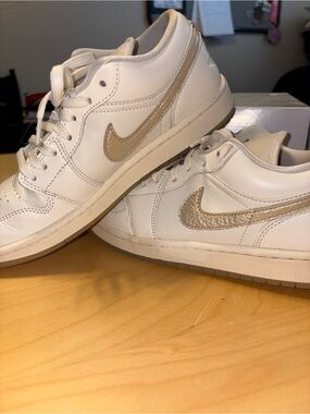 Nike Women’s Low-Top Athletic Sneakers in White and Metallic Gold